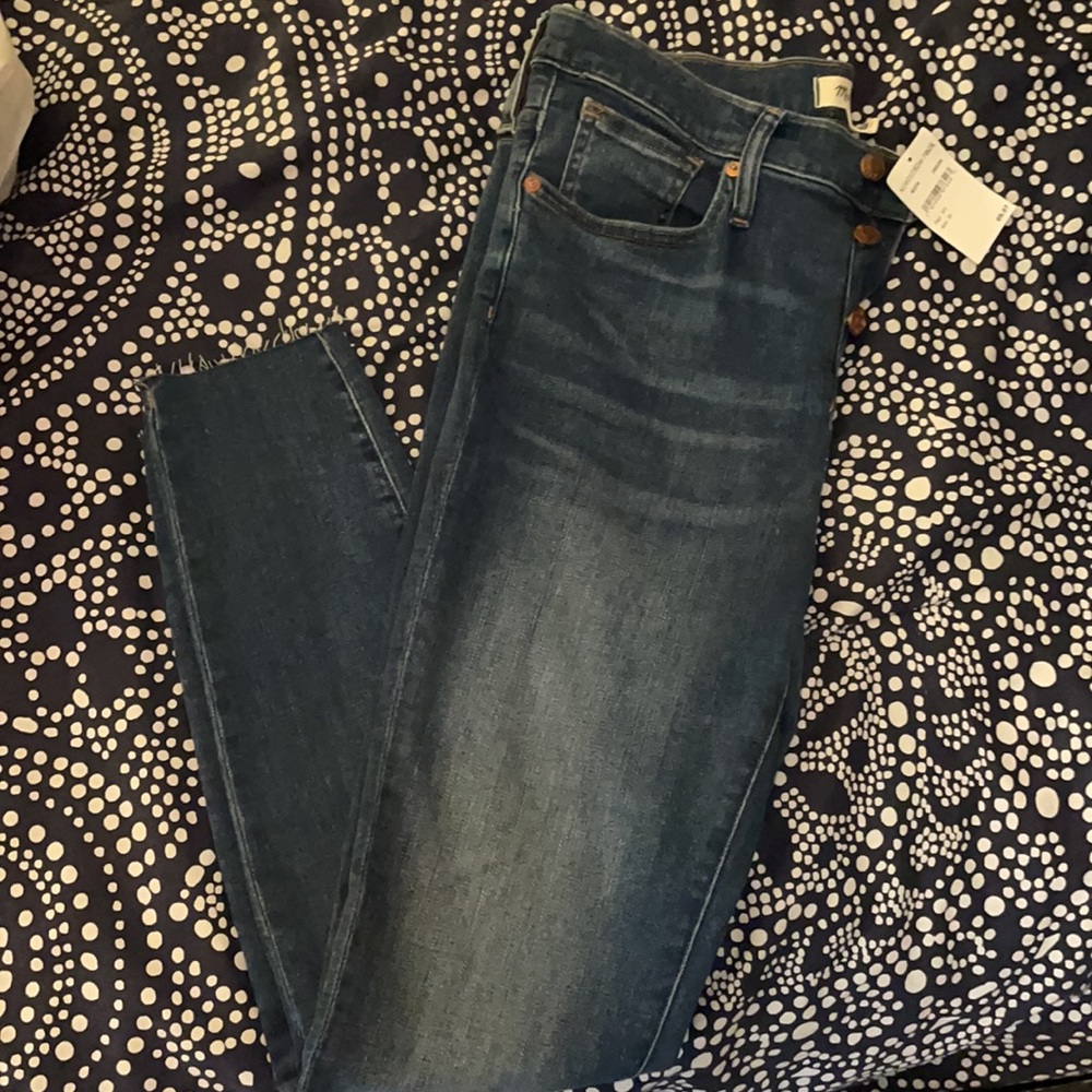 Madewell mid-rise skinny frayed edge jeans